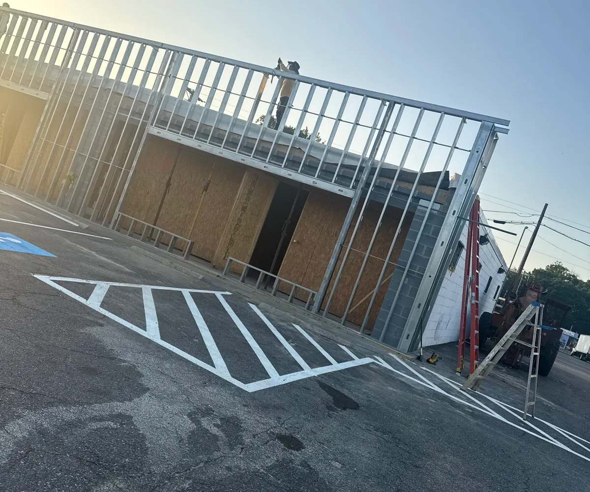 Commercial metal framing installation showing coordinated openings