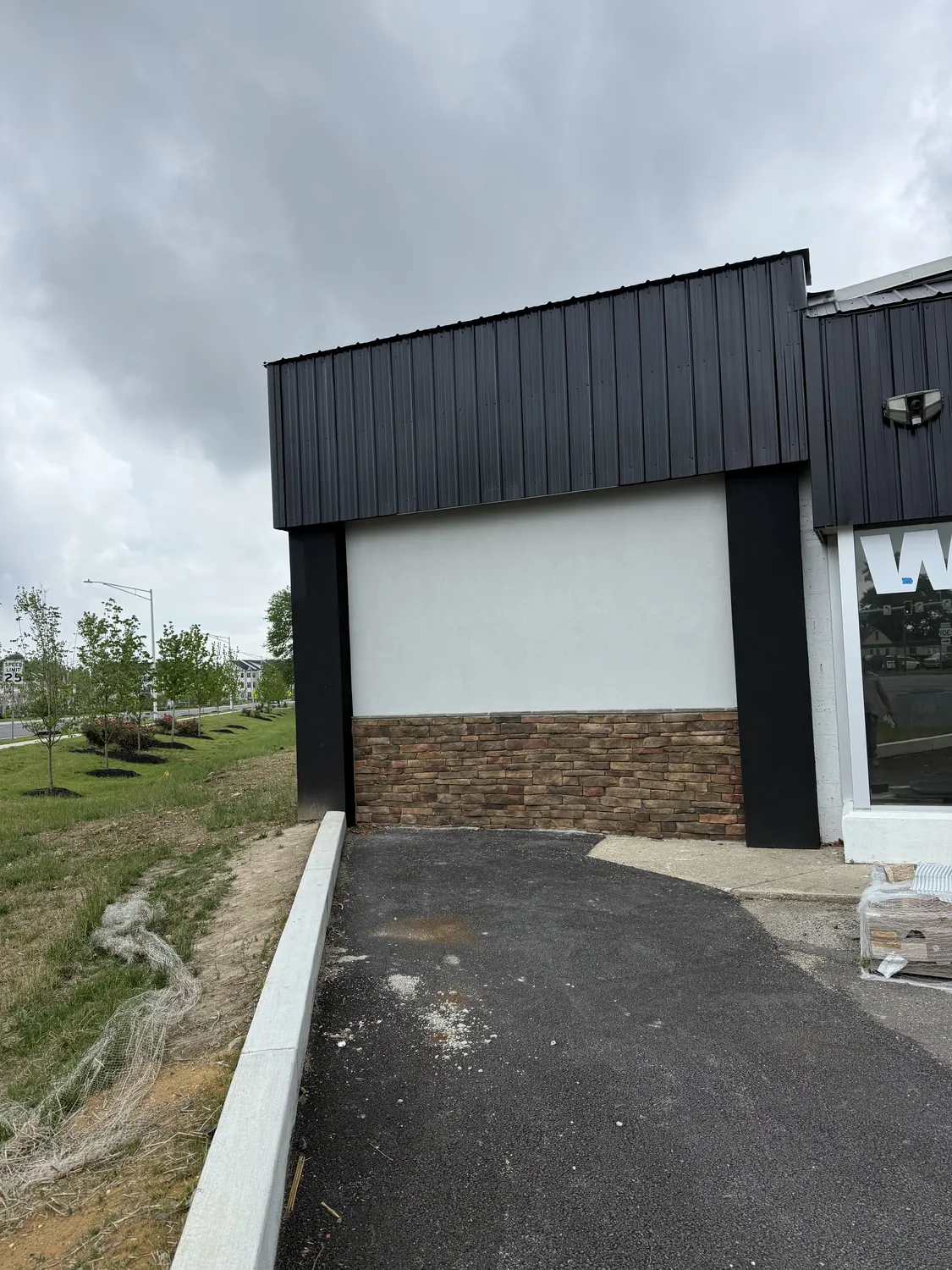 Exterior commercial renovation area after organized project work