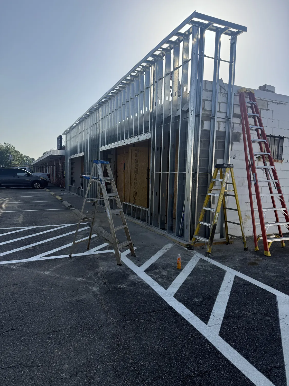 Close view of commercial light-gauge framing, openings, and connection details